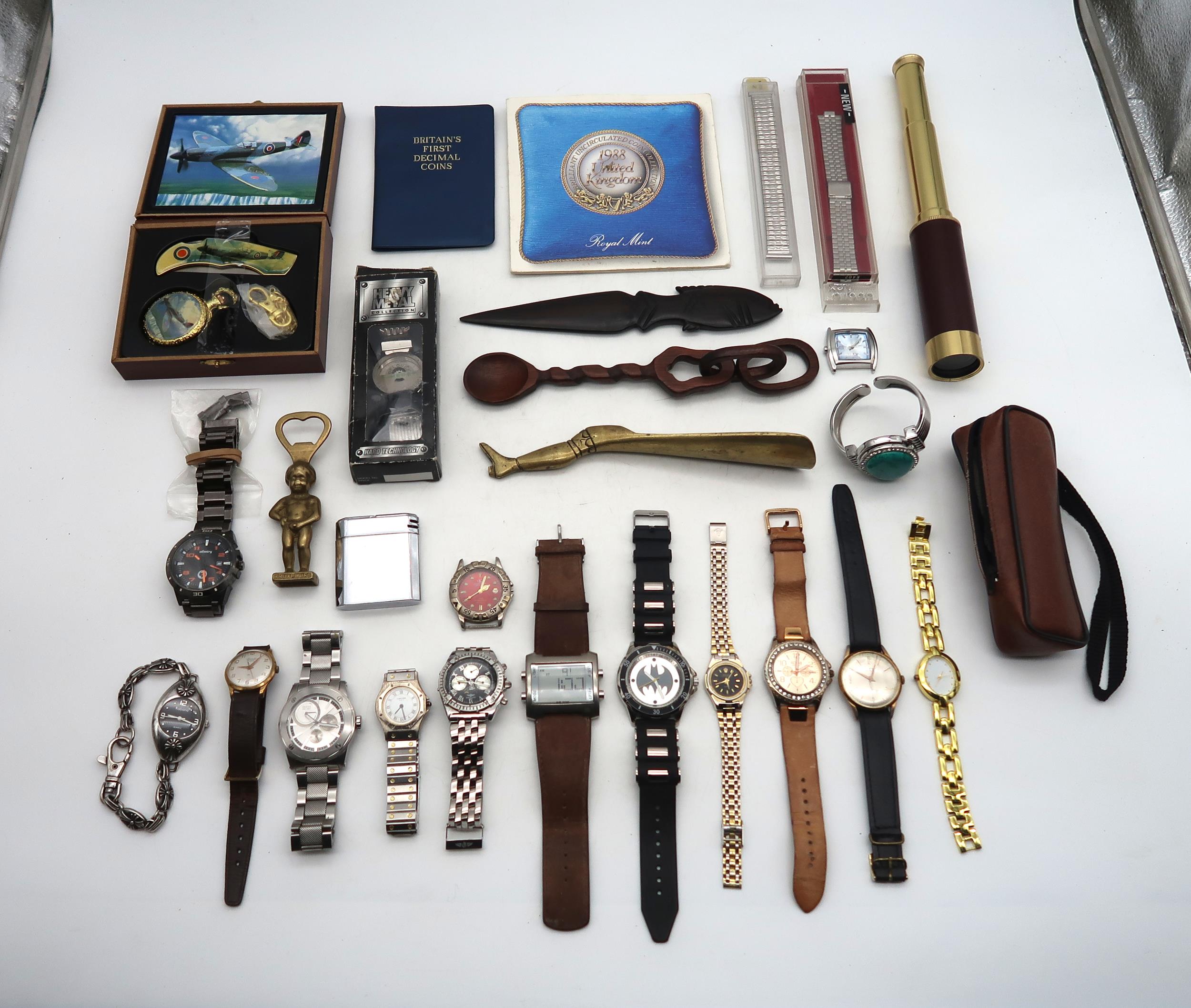 A collection of various fashion and vintage wristwatches, to include Cartel and Everite; Cartier and