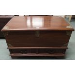 A 20th century hardwood dowry style blanket chest with brass mounted hinged top over two short