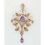 A 9ct gold amethyst and split pearl Edwardian pendant in original box, length with bail 5.5cm,