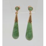 A pair of 14k gold Chinese green hardstone drop earrings, weight 9.7gms Condition Report:Available