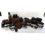 A quantity of cased vintage cameras and associated equipment Condition Report:Available upon