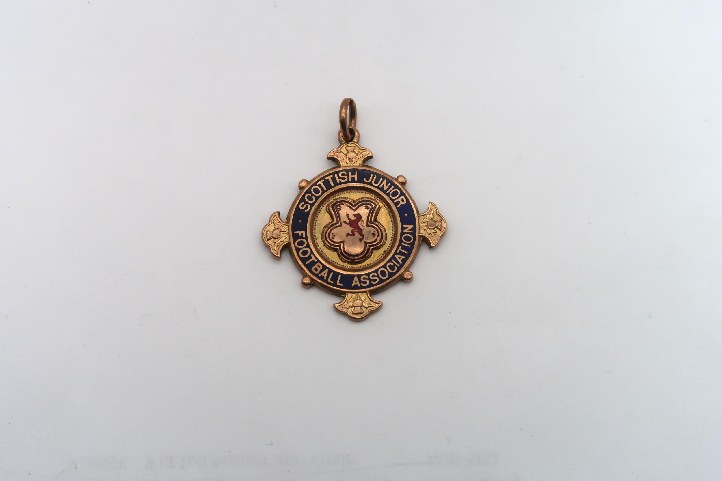 A 9ct gold Scottish Junior Football Association medal, engraved "Winners, Ashfield, J. Wilson,