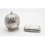 A late Victorian silver string box, the body fluted, on three ball feet, by William Hutton & Sons,