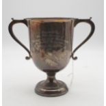 A Scottish silver twin handled presentation trophy cup, the body inscribed 'Presented by the Town