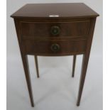 An Edwardian mahogany two drawer bedside table on square tapering supports, 70cm high x 39cm wide