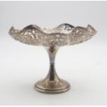 A George V silver tazza, of hexafoil form, with pierced scrolling foliate lozenge openwork, by