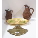 A German bronze inkwell, a continental majolica dish, a Scottish salt glazed jug decorated with