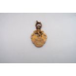 A 9ct gold Lanarkshire Football Association medal, engraved verso "Won by Motherwell F.C, 1911-12,