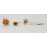 A yellow metal garnet and diamond lapel pin, two yellow metal rings, 9ct pearl earrings, a yellow