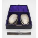 A cased set of George V silver brushes and a comb, makers mark rubbed, Birmingham 1291 Condition