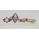 Four 9ct gold gem set rings to include a garnet & pearl flower ring, weight together 9.7gms