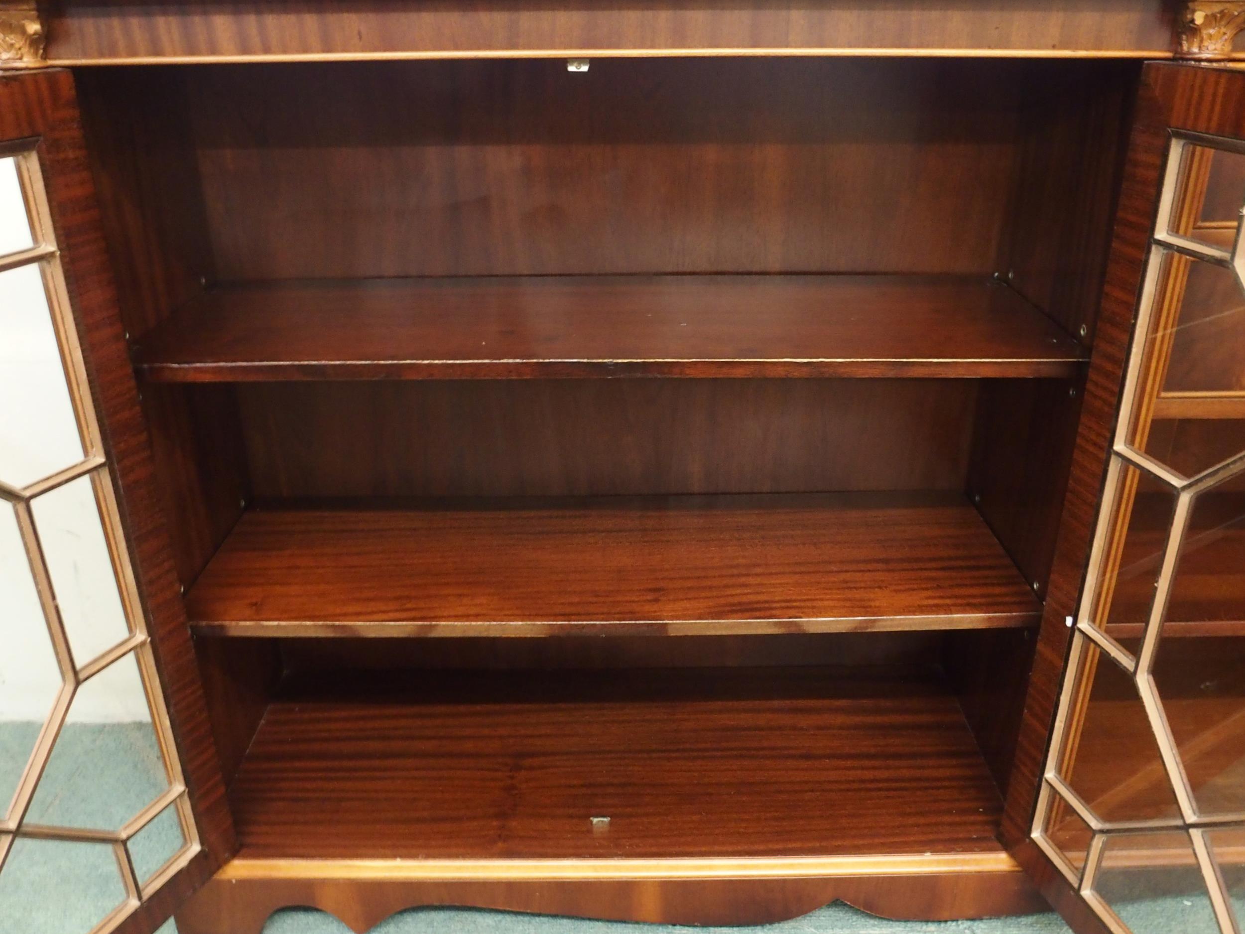 A 20th century mahogany reproduction astragal glazed bookcase, 96cm high x 148cm wide x 38cm deep - Image 5 of 5