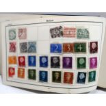 STAMPS a collection in three albums plus loose in envelopes, the Empire Postage Stamp Album includes
