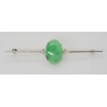 A Chinese green hardstone brooch, the green hardstone measures approx 15.7mm x 11mm x 4.5mm,