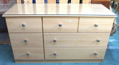 A contemporary pine veneered bank of seven drawers, 72cm high x 122cm wide x 45cm deep Condition
