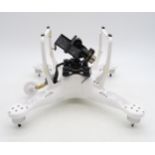 A DJI Phantom drone, with rucksack containing control, monitor etc. Condition Report:Available