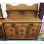 A 20th century oak art nouveau sideboard, 148cm high x 138cm wide x 50cm deep Condition Report: