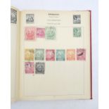 STAMPS a Stanley Gibbons "Improved" Postage Stamp Album, containing a wide variety of