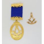 A yellow metal Masonic jewel in original fitted box from Hamilton & Inches, Edinburgh, together with