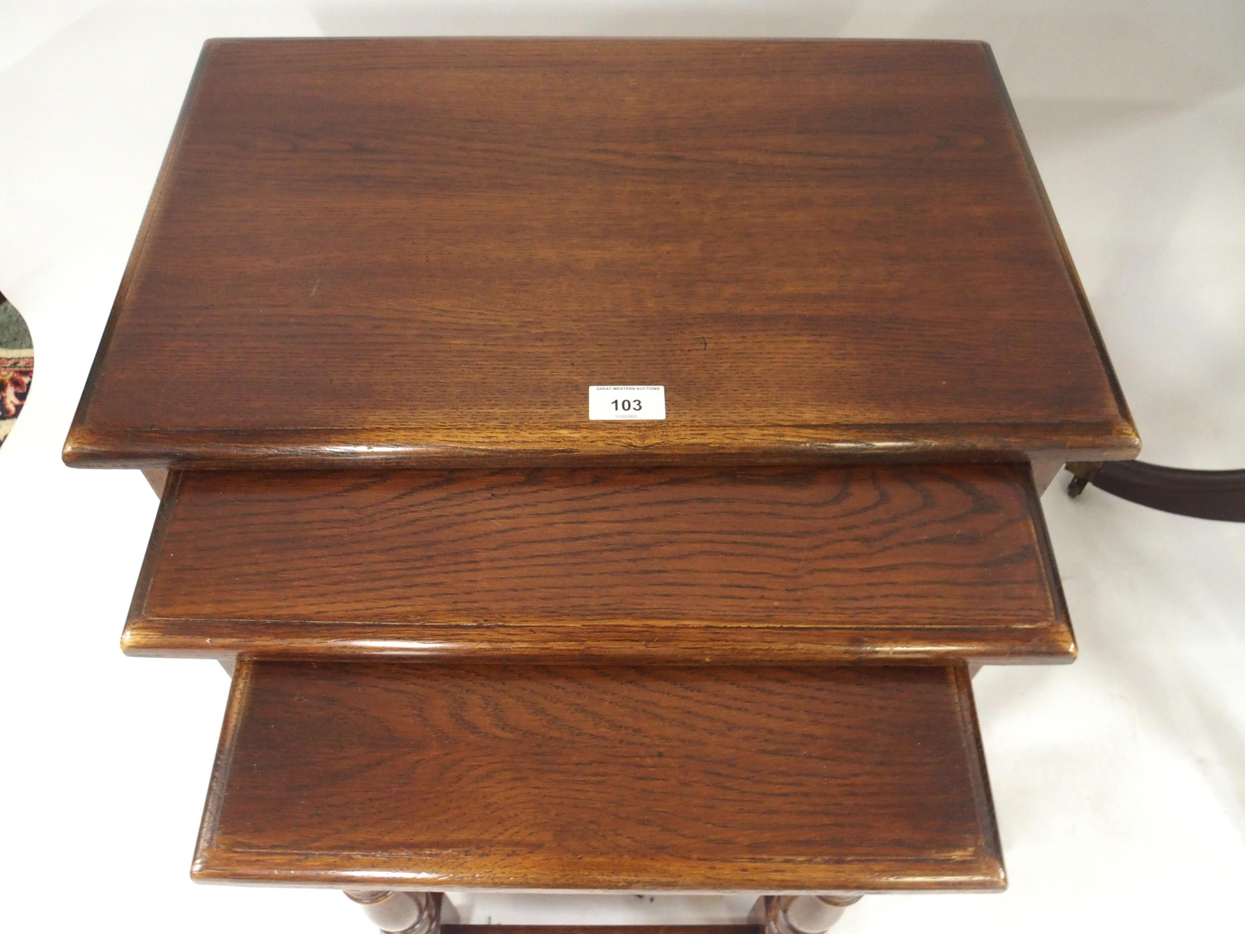 A 20th century mahogany open bookcase, oak nest of three tables and tilt top circular occasional - Image 6 of 6