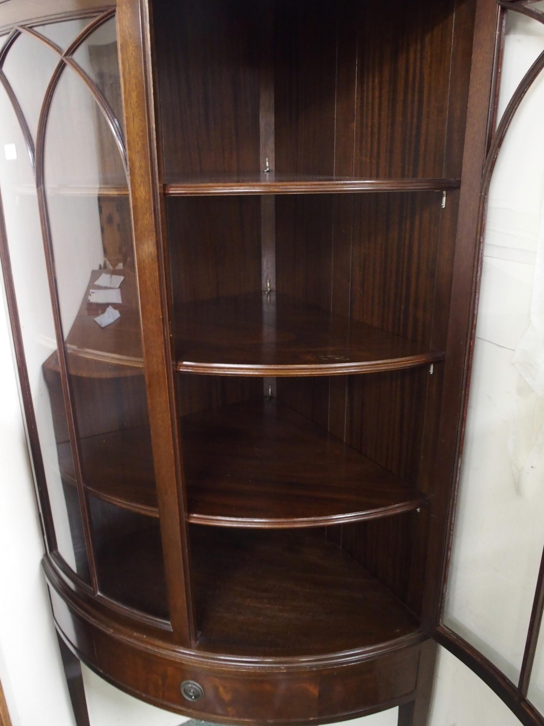 A 20th century mahogany bow front glazed corner cabinet with pair of glazed doors over single drawer - Image 3 of 4