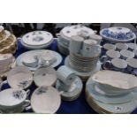 A Royal Worcester Woodland dinner service comprising plates, bowls, tureens, soup coupes, coffee