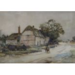 JOHN TERRIS R.S.W, R.IÊTwo figures before a thatched cottage, signed, watercolour, 38 x 54cm