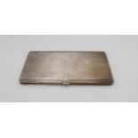 A large George VI silver cigarette case, the body with engine turned decoration, by Adie Brothers