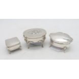A collection of silver jewellery boxes,Ê one shaped example by T H Hazlewood & Co, Birmingham