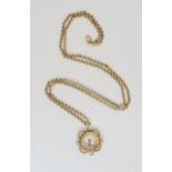 A 9ct gold mounted compass on a 9ct belcher chain, length 62cm, weight 15.6gms Condition Report: