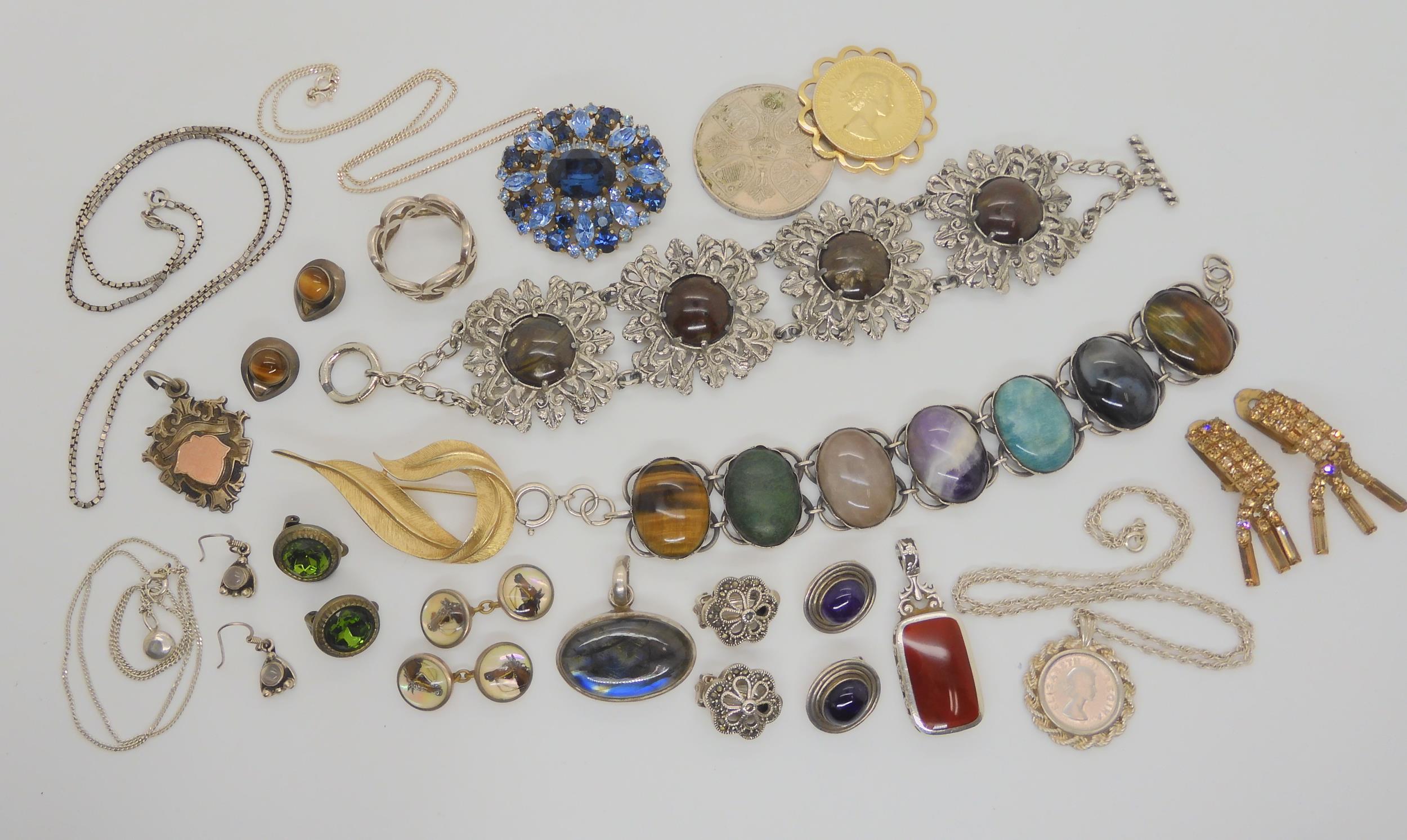 A South African silver bracelet set with specimen gemstones, a Sarah Coventry brooch and other items