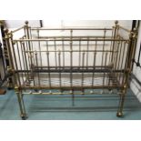 A Victorian brass framed children's crib with drop sides, 117cm high x 68cm wide x 133cm long