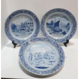 Three Delft chargers with painted decoration Condition Report:Available upon request