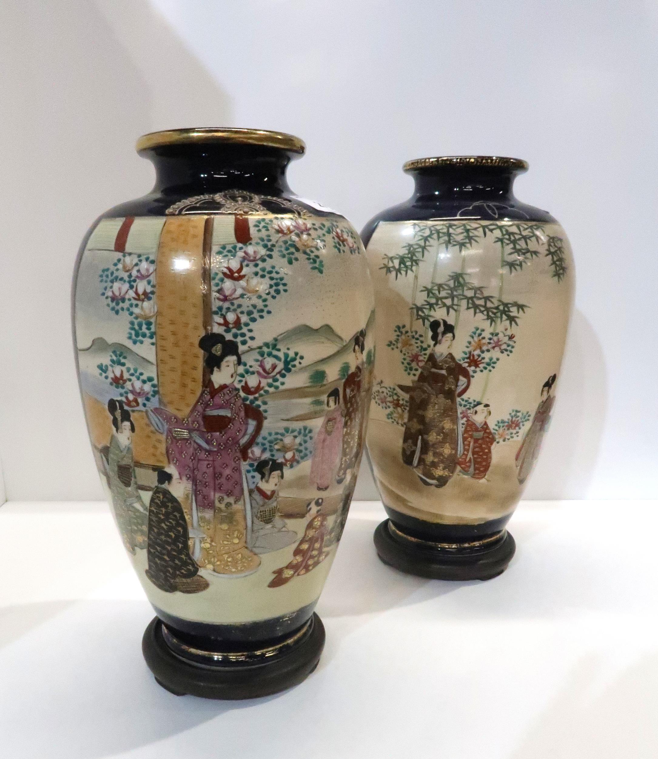 A pair of Japanese satsuma vases decorated with geishas, 34cm high on stands Condition Report: