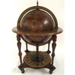 A 20th century globe drinks cabinet with veneered hinged topped concealing fitted interior, 100cm
