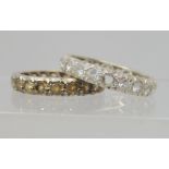 Two 9ct white gold clear gem set eternity rings, sizes O & O1/2, weight 5.8gms Condition Report: