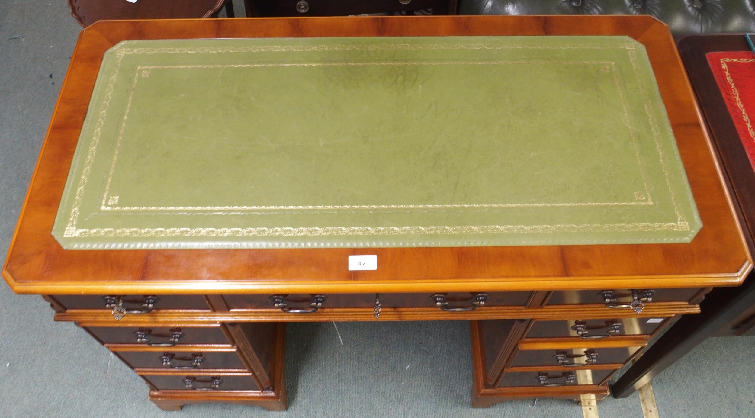 A 20th century mahogany twin pedestal writing desk with green writing skiver over central long - Image 2 of 8