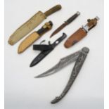 A collection of assorted hunting-style knives, together with a decorative folding example, a