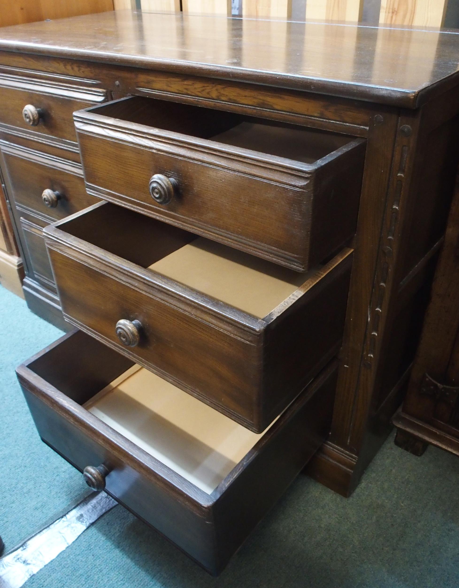 A mid 20th century elm and beech Ercol chest of six drawers, 70cm high x 98cm wide x 49cm deep - Image 3 of 4