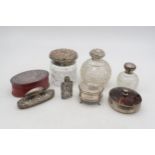 A collection of silver vanity items including a silver and tortoiseshell powder box, by Collett &