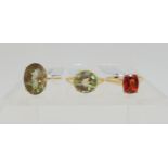 Three Andesine rings, an unusual type of labradorite feldspar. A 9ct gold cushion cut red andesine