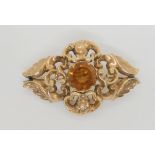 A Victorian yellow metal brooch set with a citrine, length 6.2cm, weight 9.1gms Condition Report: