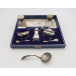 A collection of silver including a three piece cruet set, by Turner & Simpson, Birmingham 1962, a