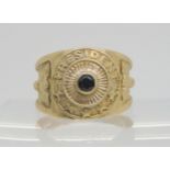 A 9ct gold American style college ring, set with a sapphire, size U1/2, weight 8.6gms Condition