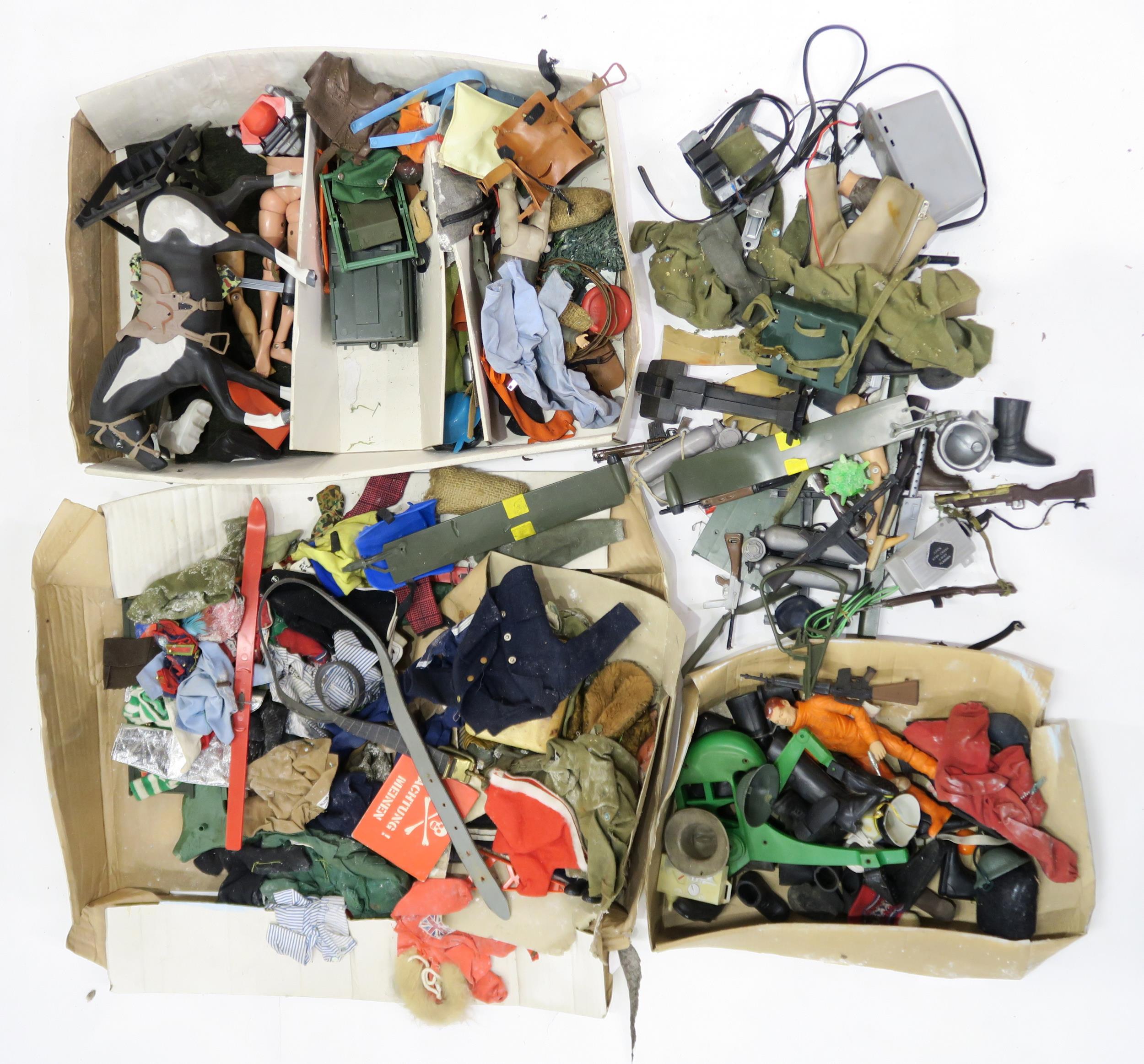 A large quantity of vintage Action Man figures and accessories Condition Report:Available upon
