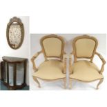 A 20th century green Sorento style shaped front display cabinet, oval wall mirror and a pair of