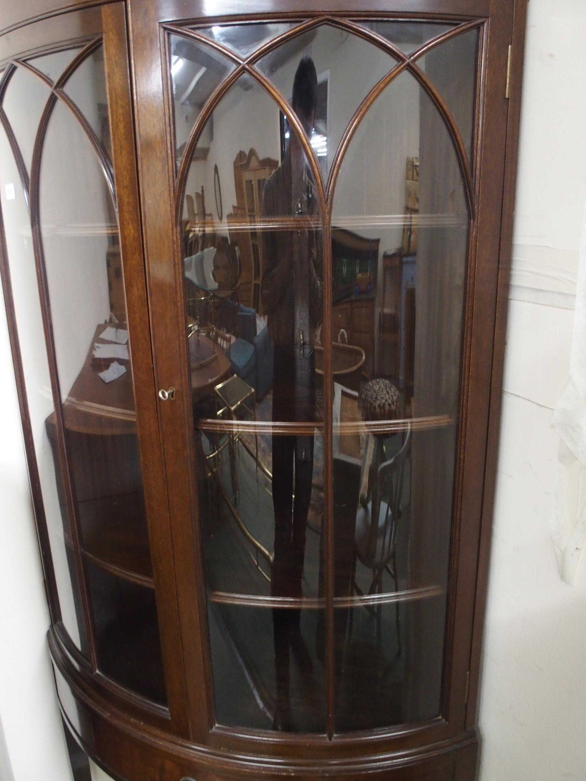 A 20th century mahogany bow front glazed corner cabinet with pair of glazed doors over single drawer - Image 4 of 4