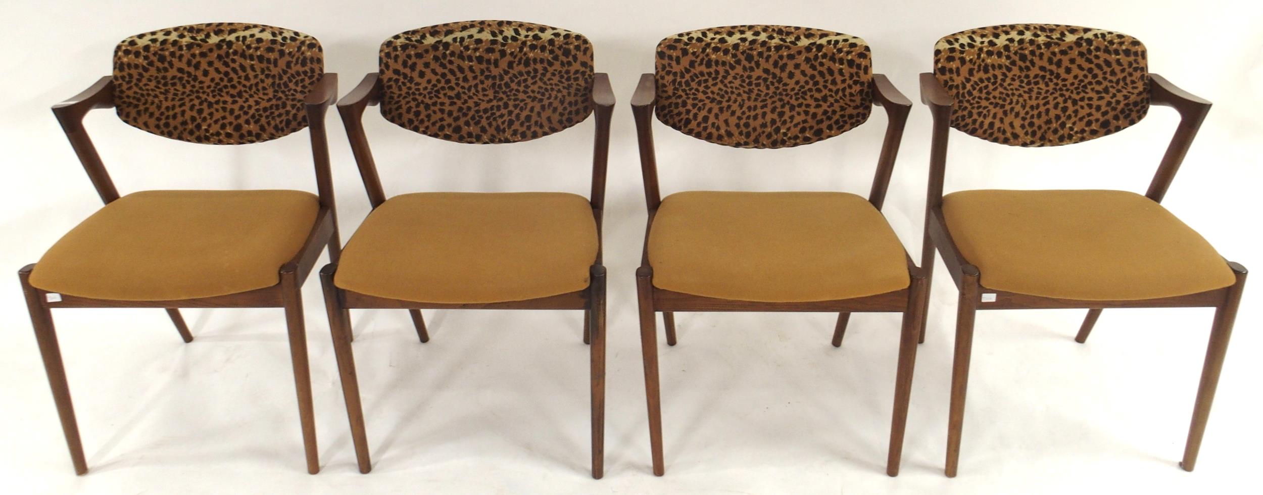 A lot of four mid 20th century teak framed Kai Kristiansen model 42 dining chairs with distinctive