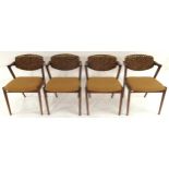 A lot of four mid 20th century teak framed Kai Kristiansen model 42 dining chairs with distinctive