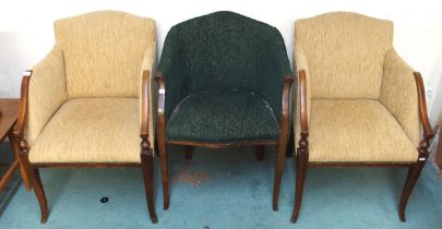 A pair of 20th century mahogany framed beige upholstered armchairs and another 20th century mahogany
